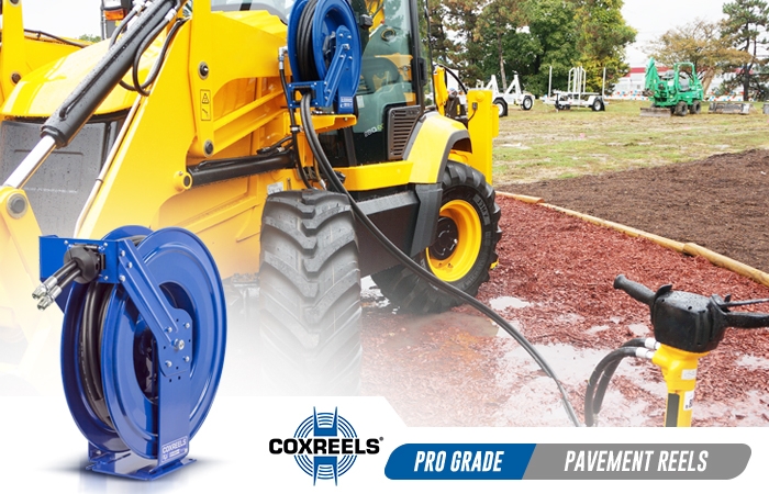 Backhoe loader with Coxreels hydraulic hose reel and jackhammer attachment